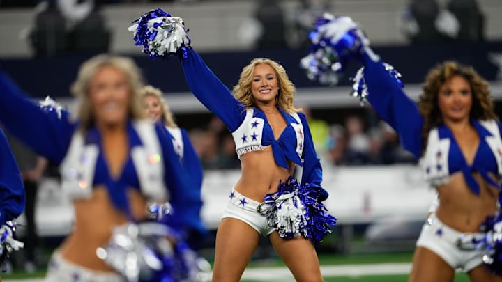 Cowboys cheerleaders perform during a game against the Giants. Cowboys cheerleaders perform during a game against the Giants.