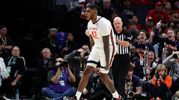 Mar 15, 2024; Minneapolis, MN, USA; Illinois Fighting Illini forward Dain Dainja (42) celebrates