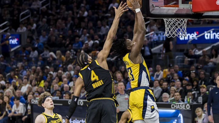 Mar 22, 2024; San Francisco, California, USA; Indiana Pacers forward Aaron Nesmith (23) shoots as Golden State Warriors guard Moses Moody (4) defends during the second half at Chase Center. Mandatory Credit: John Hefti-Imagn Images