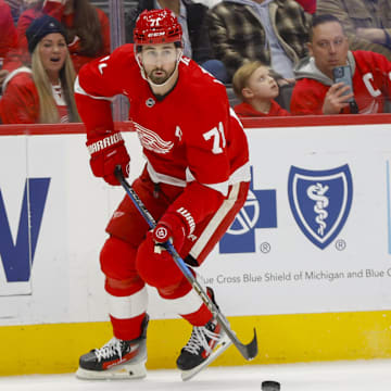 Detroit Red Wings center Larkin handles the puck during the second period of a game between the Detroit Red Wings and the Anaheim Ducks at Little Caesars Arena. 
