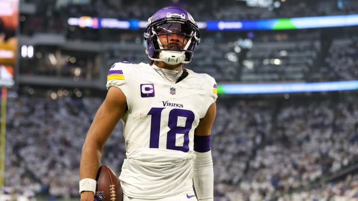 Dec 24, 2023; Minneapolis, Minnesota, USA; Minnesota Vikings wide receiver Justin Jefferson (18) celebrates his touchdown against the Detroit Lions during the second quarter at U.S. Bank Stadium.