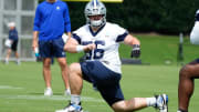 Jun 5, 2024; Frisco, TX, USA;  Dallas Cowboys center Cooper Beebe (56) goes through a drill during practice at the Ford Center at the Star Training Facility in Frisco, Texas. 