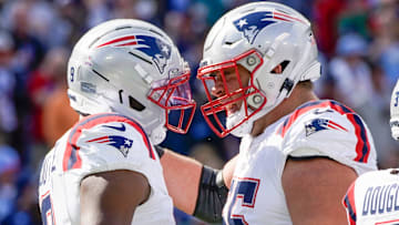 New England Patriots wide receiver Kayshon Boutte (9) celebrates his touchdown with center Garrett Bradbury (65) during the second quarter against the Tennessee Titans at Nissan Stadium in Nashville, Tenn., Sunday, Oct. 19, 2025.