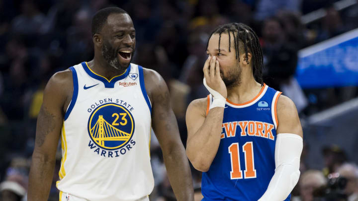 Mar 18, 2024; San Francisco, California, USA; Golden State Warriors center Draymond Green (23) and New York Knicks guard Jalen Brunson (11) share a laugh during the first half at Chase Center. Mandatory Credit: John Hefti-USA TODAY Sports