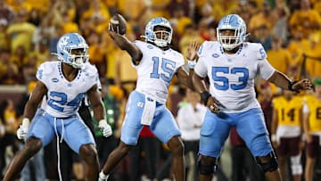 Aug 29, 2024; Minneapolis, Minnesota, USA; North Carolina Tar Heels quarterback Conner Harrell (15) throws the ball against the Minnesota Golden Gophers during the second half at Huntington Bank Stadium. Mandatory Credit: Matt Krohn-Imagn Images