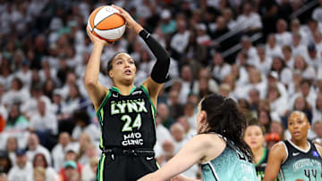 Oct 18, 2024; Minneapolis, Minnesota, USA; Minnesota Lynx forward Napheesa Collier (24) shoots over New York Liberty forward Breanna Stewart (30) during the first half of game four of the 2024 WNBA Finals at Target Center. Mandatory Credit: Matt Krohn-Imagn Images