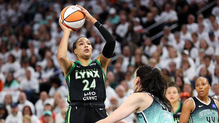 Oct 18, 2024; Minneapolis, Minnesota, USA; Minnesota Lynx forward Napheesa Collier (24) shoots over New York Liberty forward Breanna Stewart (30) during the first half of game four of the 2024 WNBA Finals at Target Center. Mandatory Credit: Matt Krohn-Imagn Images