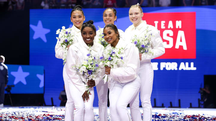 Jun 30, 2024; Minneapolis, Minnesota, USA; Sunisa Lee, Hezly Rivera, Jade Carey, Simone Biles and Jordan Chiles pose for a photo after being selected for the 2024 U.S. Olympic Women's gymnastics team during the U.S. Olympic Team Gymnastics Trials at Target Center. Mandatory Credit: Matt Krohn-USA TODAY Sports