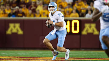 Aug 29, 2024; Minneapolis, Minnesota, USA; North Carolina Tar Heels quarterback Max Johnson (14) looks to throw against the Minnesota Golden Gophers during the first half at Huntington Bank Stadium. Mandatory Credit: Matt Krohn-USA TODAY Sports