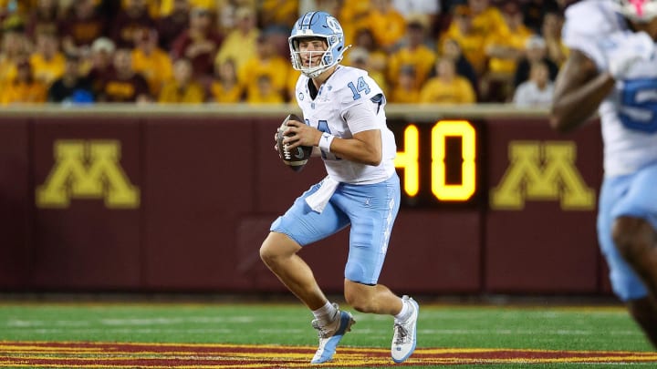 Aug 29, 2024; Minneapolis, Minnesota, USA; North Carolina Tar Heels quarterback Max Johnson (14) looks to throw against the Minnesota Golden Gophers during the first half at Huntington Bank Stadium. Mandatory Credit: Matt Krohn-USA TODAY Sports