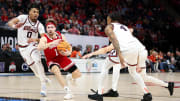 Mar 16, 2024; Minneapolis, MN, USA; Nebraska Cornhuskers guard Sam Hoiberg (1) works around Illinois Fighting Illini guard Terrence Shannon Jr. (0) during the second half at Target Center.