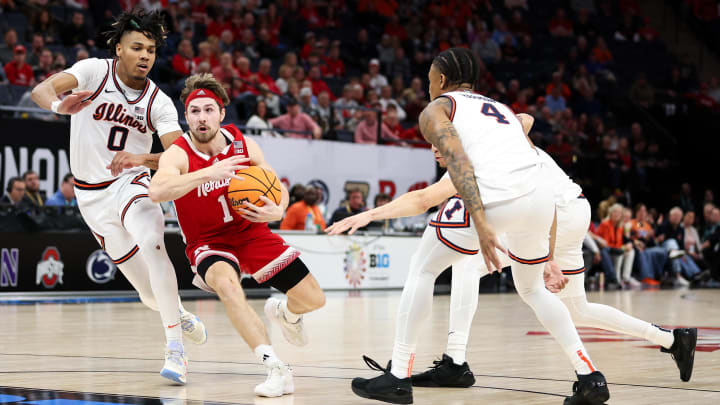 Mar 16, 2024; Minneapolis, MN, USA; Nebraska Cornhuskers guard Sam Hoiberg (1) works around Illinois Fighting Illini guard Terrence Shannon Jr. (0) during the second half at Target Center.