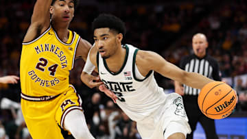 Mar 14, 2024; Minneapolis, MN, USA; Michigan State Spartans guard Jaden Akins (3) works around
