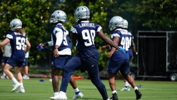 Jun 5, 2024; Frisco, TX, USA;  Dallas Cowboys defensive end DeMarcus Lawrence Elliott (90) goes through a drill during practice at the Ford Center at the Star Training Facility in Frisco, Texas. 