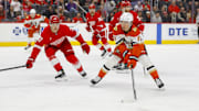 Feb 23, 2025; Detroit, Michigan, USA; Anaheim Ducks center Trevor Zegras (11) handles the puck during the first period of the game between the Detroit Red Wings and the Anaheim Ducks at Little Caesars Arena. Mandatory Credit: Brian Bradshaw Sevald-Imagn Images