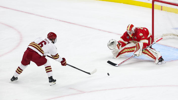 Apr 13, 2024; Saint Paul, Minnesota, USA; Boston College Eagles forward Will Smith (6) shoots against Denver Pioneers goaltender Matt Davis (35) during the first period of the championship game of the 2024 Frozen Four college ice hockey tournament at Xcel Energy Center. Mandatory Credit: Matt Krohn-USA TODAY Sports