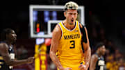 Nov 6, 2024; Minneapolis, Minnesota, USA; Minnesota Golden Gophers forward Dawson Garcia (3) celebrates his three-point basket against the Oral Roberts Golden Eagles during the second half at Williams Arena. Mandatory Credit: Matt Krohn-Imagn Images