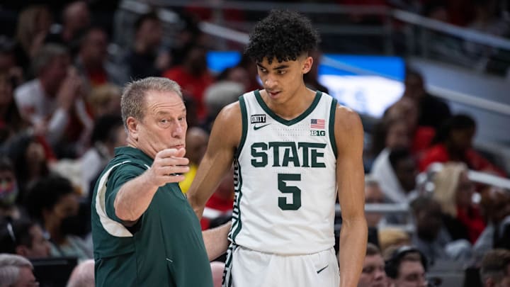 Mar 10, 2022; Indianapolis, IN, USA; Michigan State Spartans head coach Tom Izzo talks with guard Max Christie (5) in the first half against the Maryland Terrapins at Gainbridge Fieldhouse. Mandatory Credit: Trevor Ruszkowski-Imagn Images