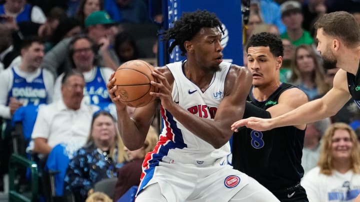 Apr 12, 2024; Dallas, Texas, USA; Detroit Pistons center James Wiseman (13) looks to score against Dallas Mavericks guard Josh Green (8) during the first half at American Airlines Center. Mandatory Credit: Chris Jones-USA TODAY Sports