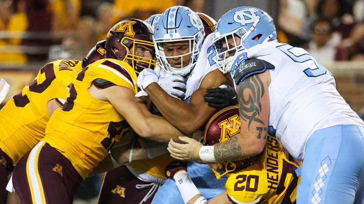 North Carolina running back Omarion Hampton (28) runs the ball against Minnesota during the first half at Huntington Bank Stadium in Minneapolis on Aug. 29, 2024. 