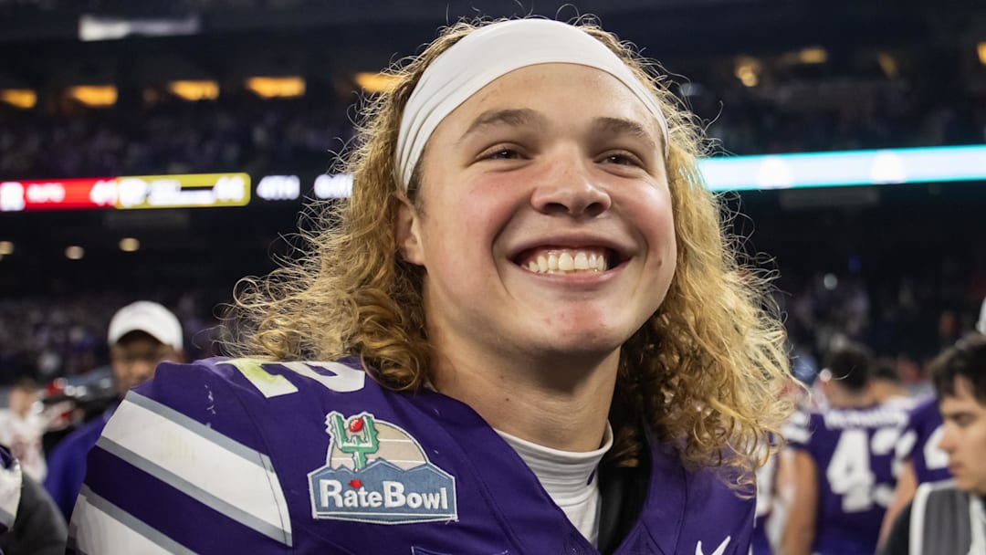 Dec 26, 2024; Phoenix, AZ, USA; Kansas State Wildcats quarterback Avery Johnson (2) against the Rutgers Scarlet Knights during the Rate Bowl at Chase Field. Mandatory Credit: Mark J. Rebilas-Imagn Images