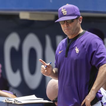 May 25, 2024; Hoover, AL, USA; The LSU Tigers head coach Jay Johnson signals in to his players during a game against the South Carolina Gamecocks at the SEC Baseball Tournament at Hoover Metropolitan Stadium. Mandatory Credit: Vasha Hunt-USA TODAY Sports