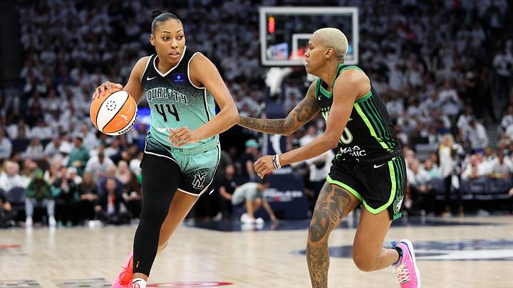 Oct 18, 2024; Minneapolis, Minnesota, USA; New York Liberty forward Betnijah Laney-Hamilton (44) drives past Minnesota Lynx guard Courtney Williams (10) during the second half of game four of the 2024 WNBA Finals at Target Center. Mandatory Credit: Matt Krohn-Imagn Images