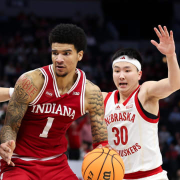 Mar 15, 2024; Minneapolis, MN, USA; Indiana Hoosiers center Kel'el Ware (1) works around Nebraska Cornhuskers forward Josiah Allick (53) during the second half at Target Center. Mandatory Credit: Matt Krohn-USA TODAY Sports