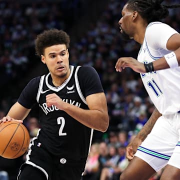 Feb 24, 2024; Minneapolis, Minnesota, USA; Brooklyn Nets forward Cameron Johnson (2) works around Minnesota Timberwolves center Naz Reid (11) during the second half at Target Center. Mandatory Credit: Matt Krohn-Imagn Images