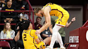 Nov 9, 2024; Minneapolis, Minnesota, USA; Minnesota Golden Gophers guard Mike Mitchell Jr. (2) grabs his leg after an injury during the second half against the Omaha Mavericks at Williams Arena. Mandatory Credit: Matt Krohn-Imagn Images