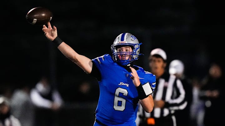 Olentangy Liberty's Alex Leonard (6) makes a pass in the first half at Olentangy Liberty High School on Friday, Oct. 24, 2025 in Powell, Ohio.
