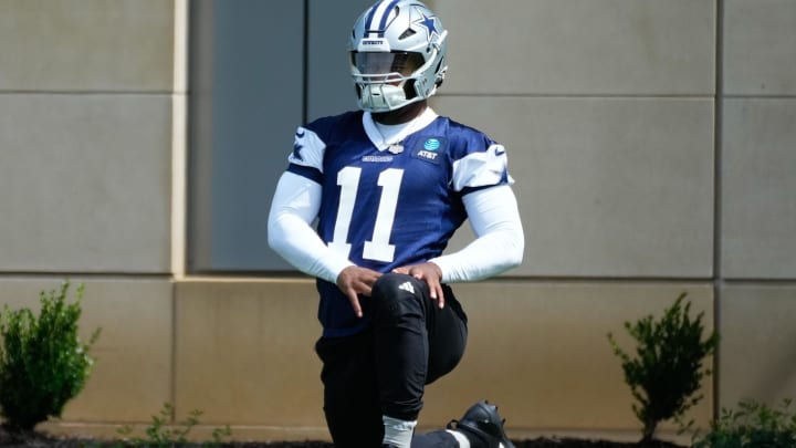 Jun 5, 2024; Frisco, TX, USA;  Dallas Cowboys linebacker Micah Parson (11) warms up during practice at the Ford Center at the Star Training Facility in Frisco, Texas. 