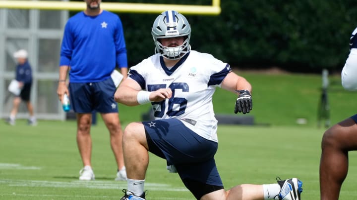 Jun 5, 2024; Frisco, TX, USA;  Dallas Cowboys center Cooper Beebe (56) goes through a drill during practice at the Ford Center at the Star Training Facility in Frisco, Texas. Mandatory Credit: Chris Jones-USA TODAY Sports