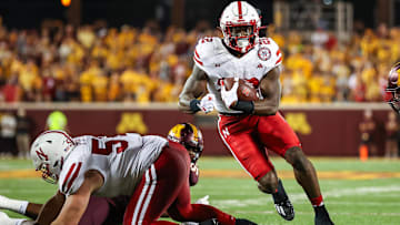 Nebraska football running back Gabe Ervin Jr. runs the ball