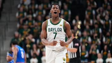 Feb 1, 2025; Waco, Texas, USA;  Baylor Bears guard VJ Edgecombe (7) reacts after committing a turnover against the Kansas Jayhawks during the first half at Paul and Alejandra Foster Pavilion. Mandatory Credit: Chris Jones-Imagn Images