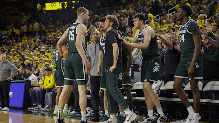Feb 21, 2025; Ann Arbor, Michigan, USA; The Michigan State bench reacts during the second half against the Michigan Wolverines at Crisler Center. Mandatory Credit: Brian Bradshaw Sevald-Imagn Images