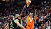 Connecticut Sun guard DiJonai Carrington shoots as Minnesota Lynx guard Courtney Williams defends during the 2024 WNBA Playoff semifinals.
