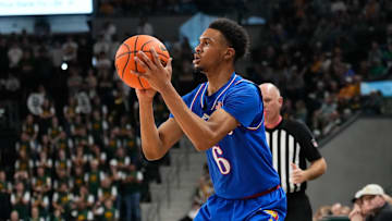 Feb 1, 2025; Waco, Texas, USA;  Kansas Jayhawks guard Rylan Griffen (6) scores a three point basket against the Baylor Bears during the first half at Paul and Alejandra Foster Pavilion. Mandatory Credit: Chris Jones-Imagn Images
