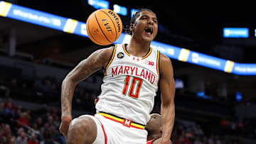 Maryland Terrapins forward Julian Reese (10) celebrates his dunk against the Rutgers Scarlet Knights during the second half at Target Center.