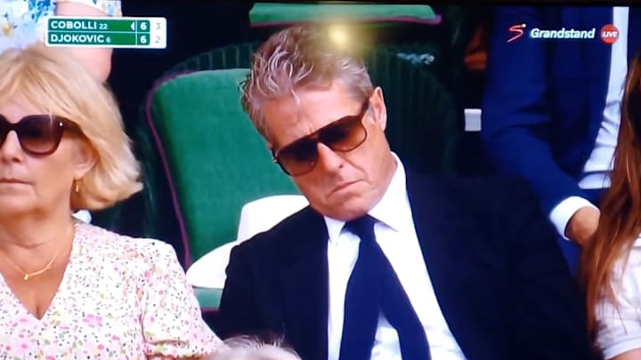 Actor Hugh Grant was sitting in the Royal Box during Wimbledon's men's quarterfinals on Wednesday.