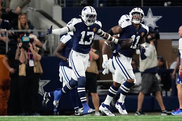 Dallas Cowboys linebacker DeMarvion Overshown celebrates after scoring on a touchdown interception against the New York Giant