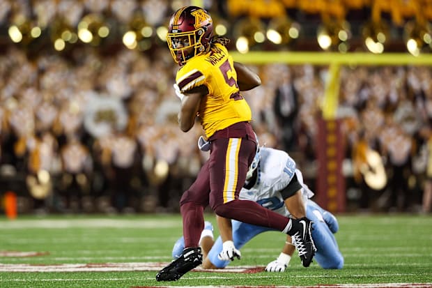 Minnesota Golden Gophers defensive back Justin Walley (5) intercepts a pass.
