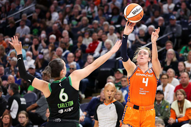 Connecticut Sun guard Marina Mabrey shoots over Minnesota Lynx forward Bridget Carleton during the WNBA playoffs. 