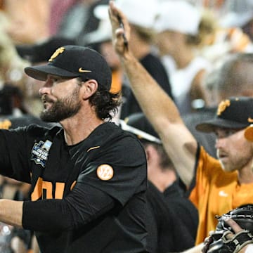 Jun 24, 2024; Omaha, NE, USA;  Tennessee Volunteers head coach Tony Vitello signals the team against the Tennessee Volunteers during the ninth inning at Charles Schwab Field Omaha. Mandatory Credit: Steven Branscombe-Imagn Images