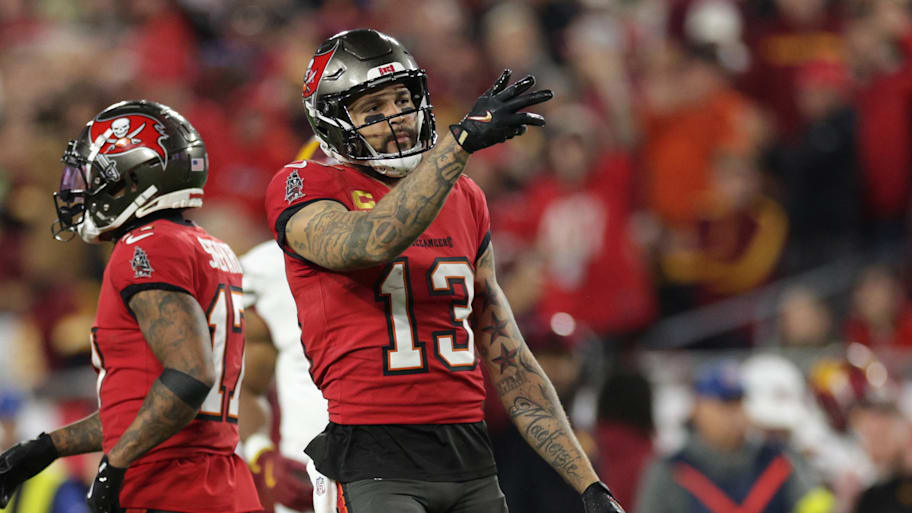 Jan 12, 2025; Tampa, Florida, USA; Tampa Bay Buccaneers wide receiver Mike Evans (13) reacts after a first down during the third quarter of a NFC wild card playoff against the Washington Commanders at Raymond James Stadium. Mandatory Credit: Nathan Ray Seebeck-Imagn Images | Nathan Ray Seebeck-Imagn Images