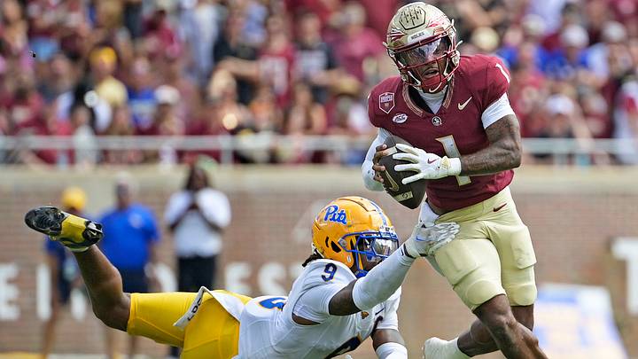 Oct 11, 2025; Tallahassee, Florida, USA; Florida State Seminoles quarterback Thomas Castellanos (1) looks to throw as he is pressured by Pittsburgh Panthers linebacker Kyle Louis (9) during the first half at Doak S. Campbell Stadium. Mandatory Credit: Melina Myers-Imagn Images