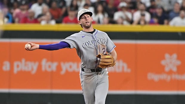 Ryan McMahon makes a throw