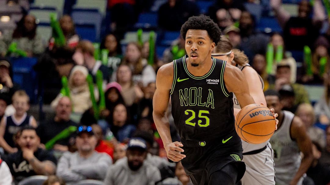 Dec 8, 2025; New Orleans, Louisiana, USA;  New Orleans Pelicans forward Trey Murphy III (25) brings the ball up court against the San Antonio Spurs during the second half at Smoothie King Center. Mandatory Credit: Stephen Lew-Imagn Images