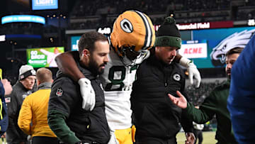 Green Bay Packers wide receiver Romeo Doubs (87) is helped off the field after being injured against the Philadelphia Eagles.