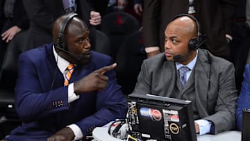 Feb 16, 2013; Houston, TX, USA; TNT broadcaster Shaquille O'Neal (left) and Charles Barkley talk during the 2013 NBA All-Star slam dunk contest at the Toyota Center. Mandatory Credit: Bob Donnan-Imagn Images